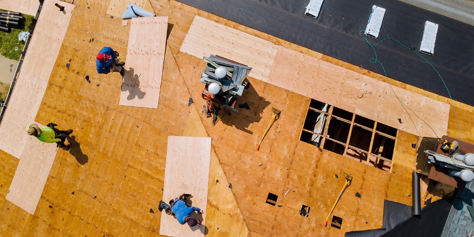 A roof undergoing re-roofing service by LM Roofing Ipswich